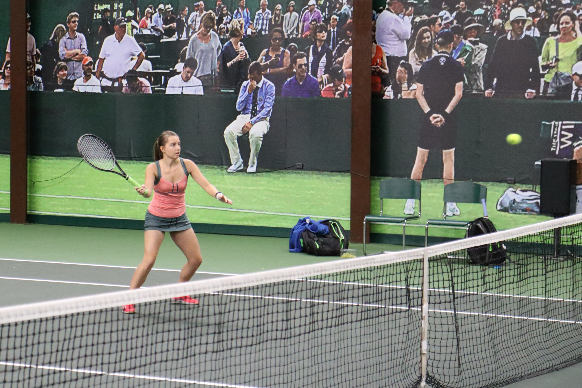 Warming up at the net before my tennis match