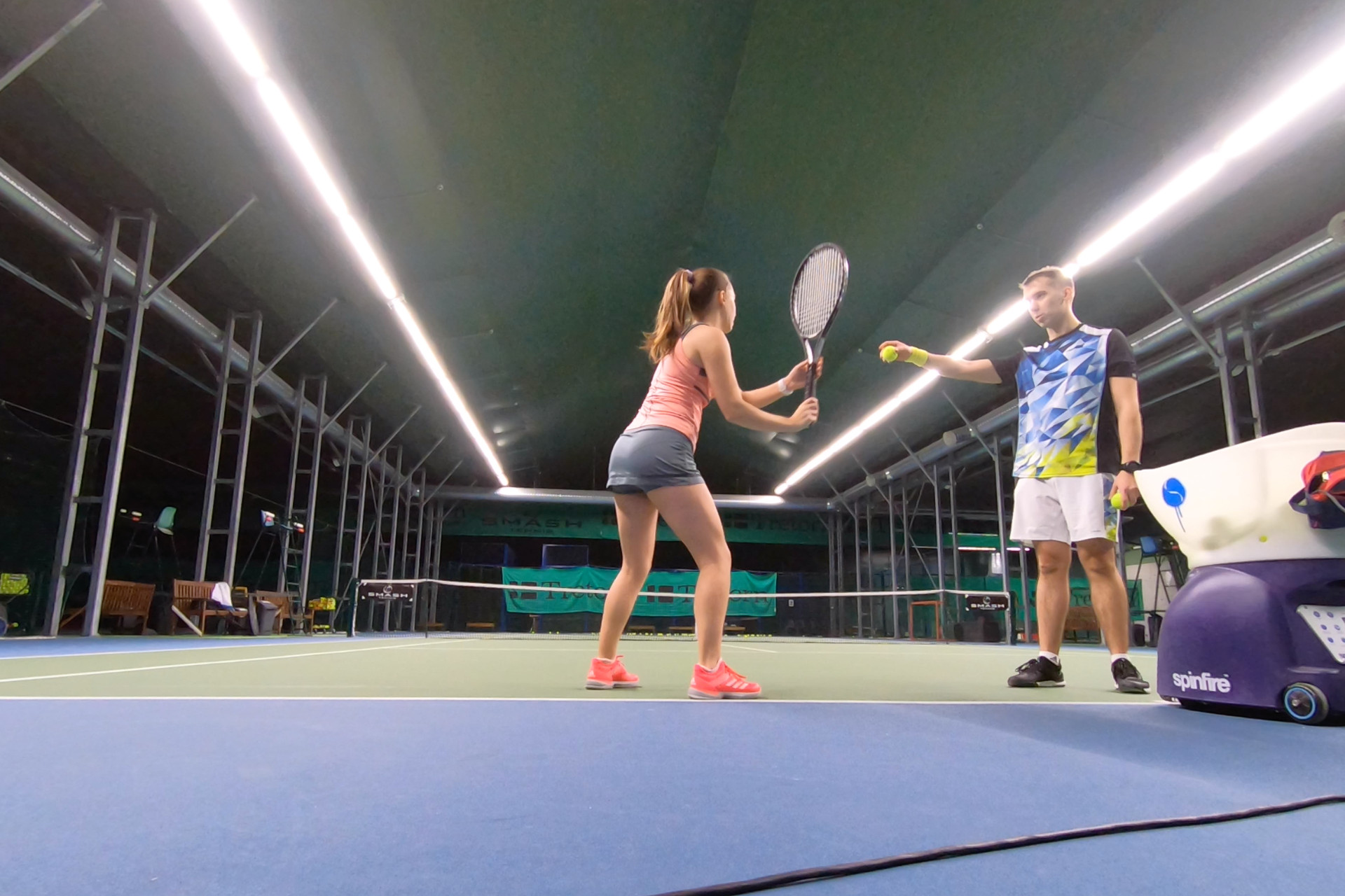 Elena learning the Federer forehand