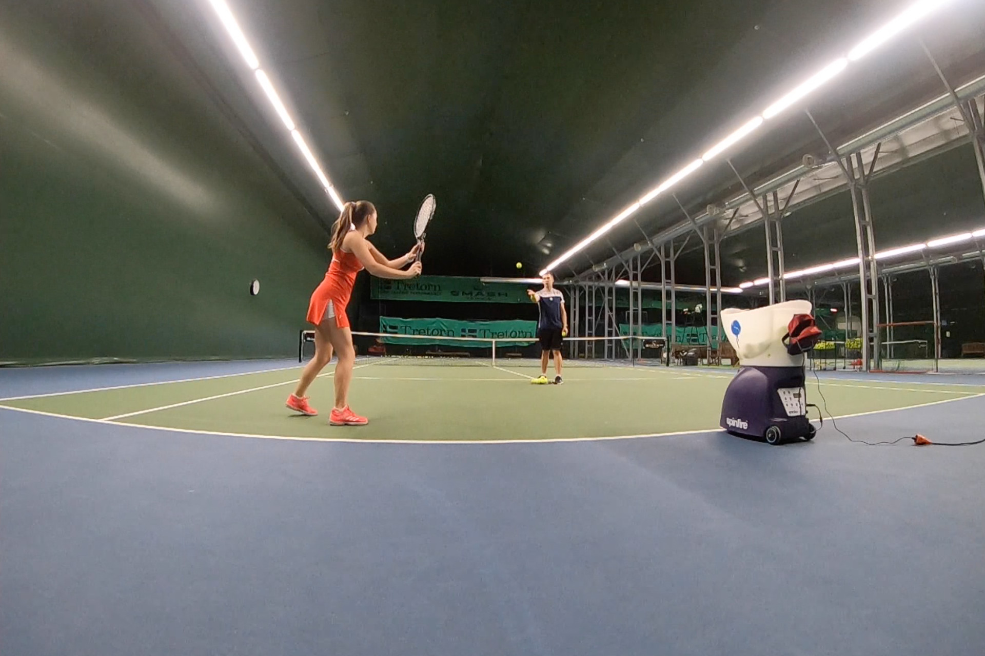 Elena practicing a shorter backswing in the forehand