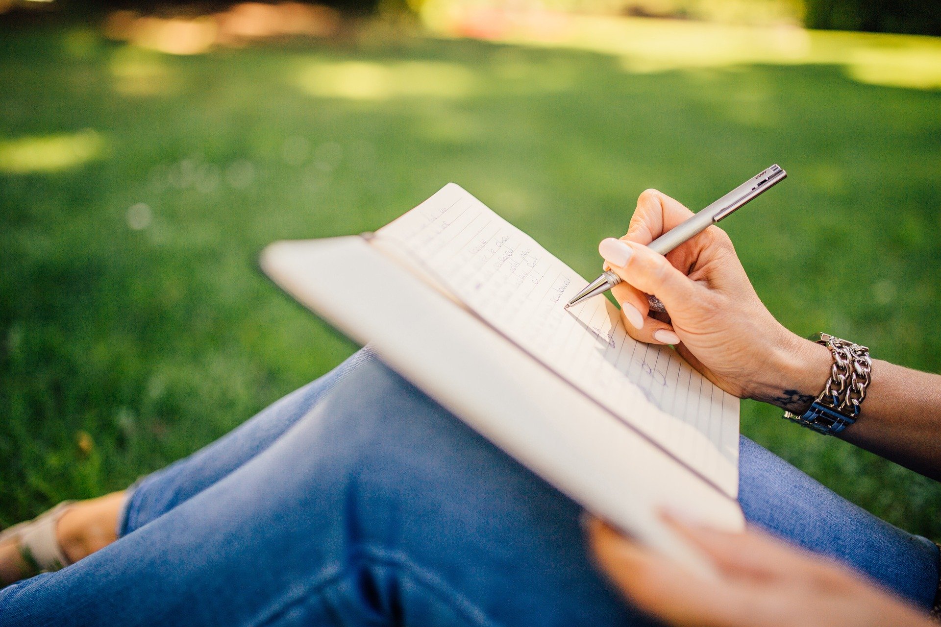 Girl writing her tennis journal